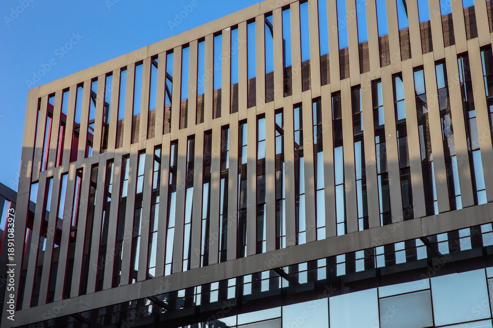 Obraz premium Modern Pavilion Architecture with Vertical Lines and Glass Design