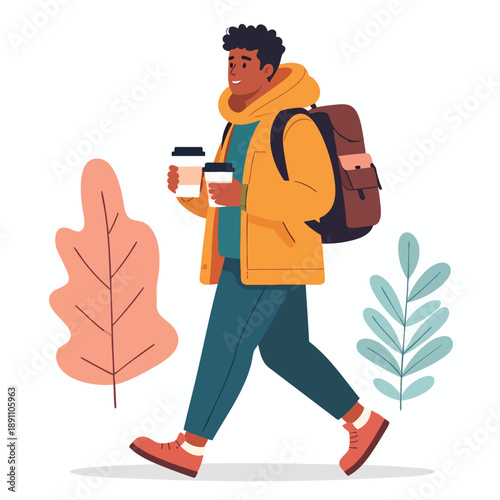 A young man walking outdoors with a coffee and backpack in a casual stroll
