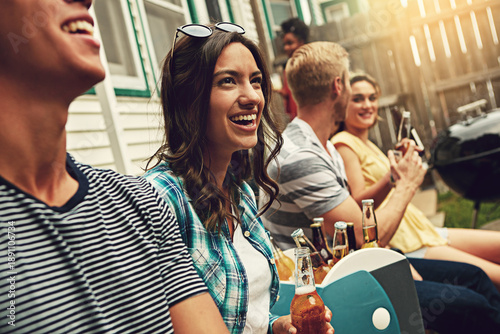 Obraz na płótnie Friends, party and happy people in backyard, beer and bonding together with holiday, bbq and relax