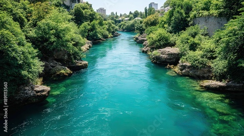 Wallpaper Mural A serene river flows through a lush landscape, showcasing vibrant turquoise waters surrounded by greenery and scenic rocks, Ideal for nature-themed projects, travel blogs, or relaxation visuals, Torontodigital.ca