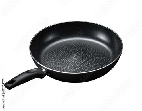 A black non-stick frying pan, handle on the side, isolated on a black background