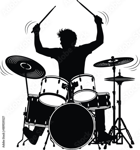 Silhouette of an energetic drummer performing a powerful crescendo moment while enthusiastically striking the cymbals and drums