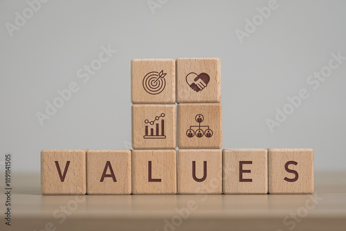 Stack wooden cubes with core values icons. Core values,corporate values concept. Company culture and strategy related to business and customer relationship, growth. Principles guide company's action.