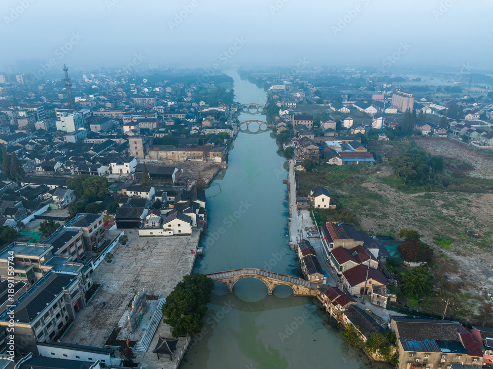 Obraz premium Ancient Shuanglin Town Huzhou China Aerial View with Traditional Bridges
