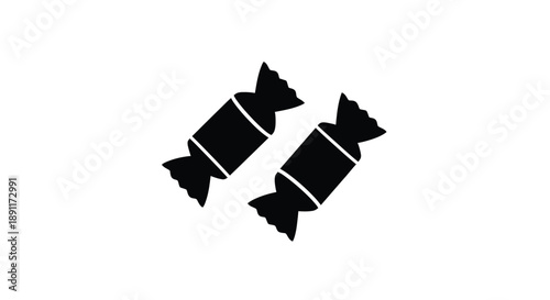 Two wrapped candies displayed diagonally a striking black silhouette