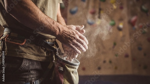 A climber preparing for asc...