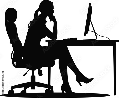 A full silhouette of a professional woman sitting at a desk working on a computer