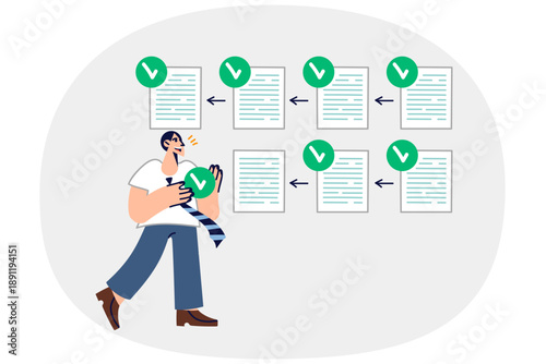 Man lawyer confirms authenticity of documents, checking for errors, standing near papers with ticks