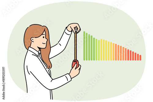 Woman business analyst measures financial chart to understand trends in company income level. Girl economic analyst in formal clothes predicts beginning of increase in savings or earnings