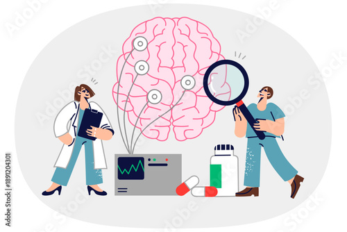Two doctors study human brain by conducting neurological experiment and using eeg equipment