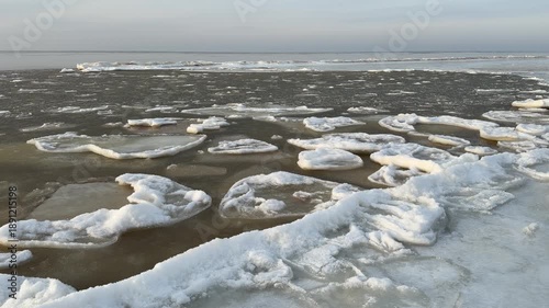 baltic sea beach winter cold  waves jurmala latvia
