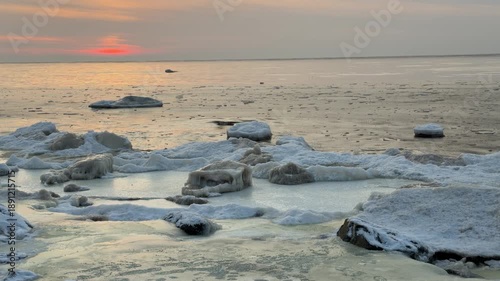 baltic sea beach winter cold  waves jurmala latvia