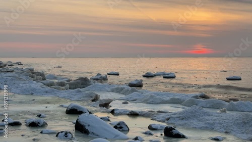baltic sea beach winter cold  waves jurmala latvia