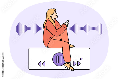Teenage woman listens to music on phone, sitting near equalizer on buttons to control playlist. Music lover girl uses audio application on smartphone to play favorite songs or audio books
