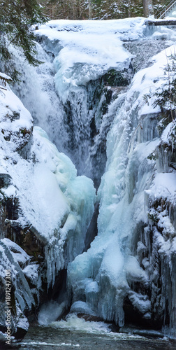 Wodospad Szklarki - waterfall in the winter time near Szklarska Poręba, Giant Mountains, Karkonosze, Lower Silesia, Poland