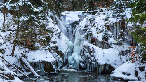 Wodospad Szklarki - waterfall in the winter time near Szklarska Poręba, Giant Mountains, Karkonosze, Lower Silesia, Poland