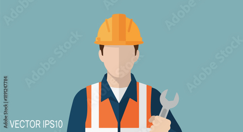 worker in safety vest holding wrench.
