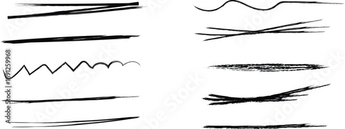 Collection of expressive black brush strokes and lines on white background