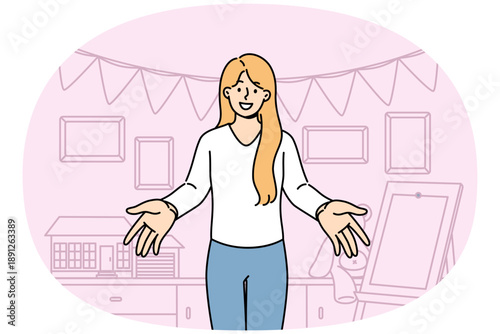 Woman kindergarten teacher invites small children, standing in room with easel and toys. Happy girl working in kindergarten or primary school greetingly puts arms to sides to hug kids