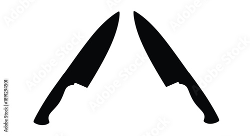 Two black silhouette chef s knives displayed against a white background