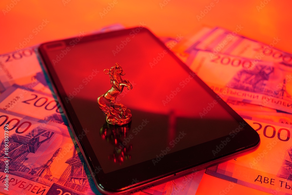custom made wallpaper toronto digitalA statuette of a horse, a tablet and paper bills. The color is red.