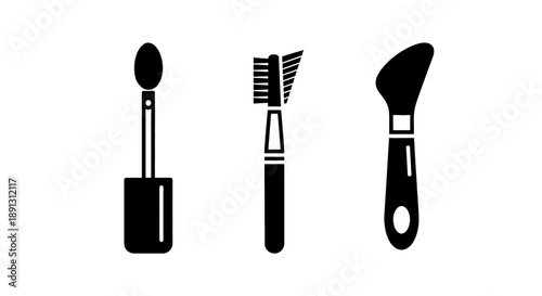 Black silhouette icons of makeup brush lipstick and powder puff on white background for beauty and cosmetics design