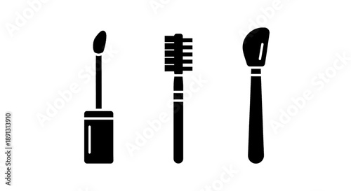 Black icons of mascara toothbrush and makeup brush on white background for beauty and hygiene concepts