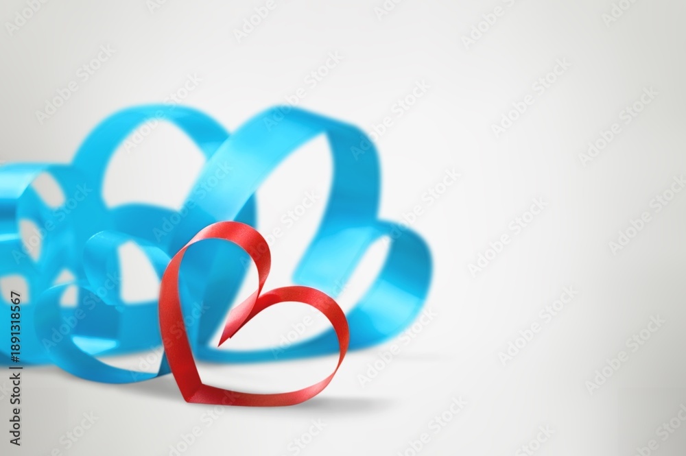 Obraz premium Valentines day card with ribbon hearts on desk