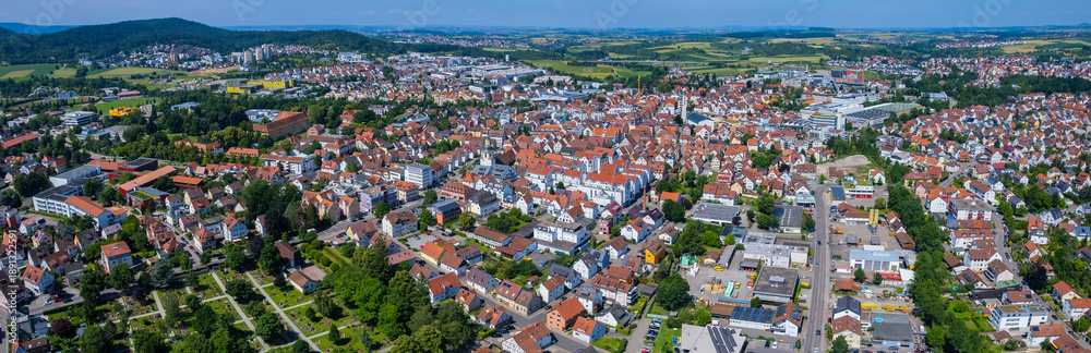 Fototapeta premium Aerial panoramic view of the city Winnenden, 71364 in Germany on a sunny spring afternoon.