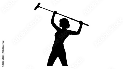Silhouette of a person wielding a large hammer.
