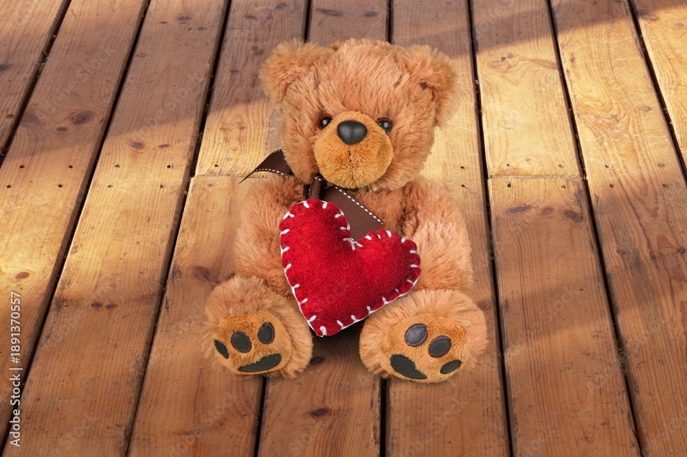 Fototapeta premium Teddy Bear hold red heart, love concept