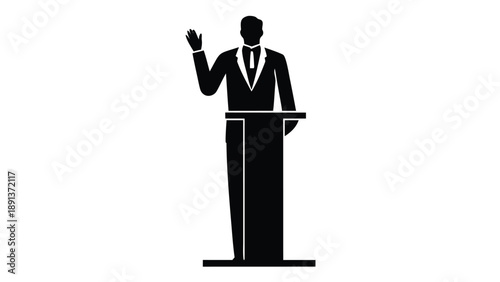 Business leader giving a presentation in a suit with hand raised
