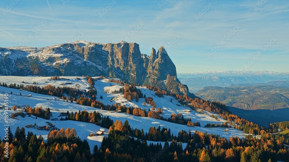 Fototapeta premium Panorama of the Dolomites mountains during autumn sunrise