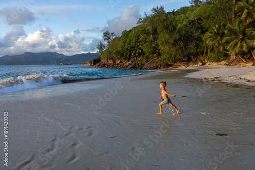Mahé Island Seychelles Boy Toddler Playing at Beach Sunset Anse Soleil