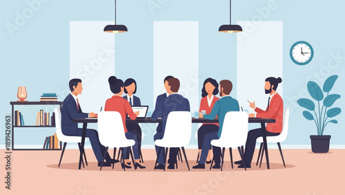 Colleagues in a meeting room discuss ideas around a table with laptops