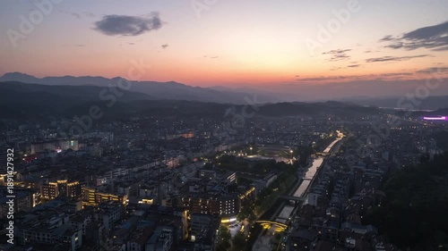 Wallpaper Mural Wudang China city panorama at sunset with mountains in the background Torontodigital.ca
