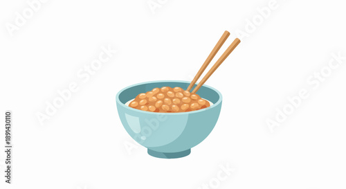 Blue bowl filled with fermented soybeans and rice, served with chopsticks