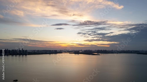 Sunset over the city skyline and water in Wuhan, China