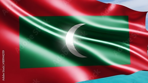 Maldives flag waving in the wind with clear blue sky