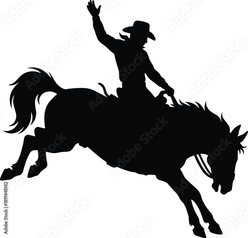 Silhouette of rodeo cowboy riding bucking bronco in dynamic action pose, representing western lifestyle, equestrian sport, freedom, and American ranch tradition