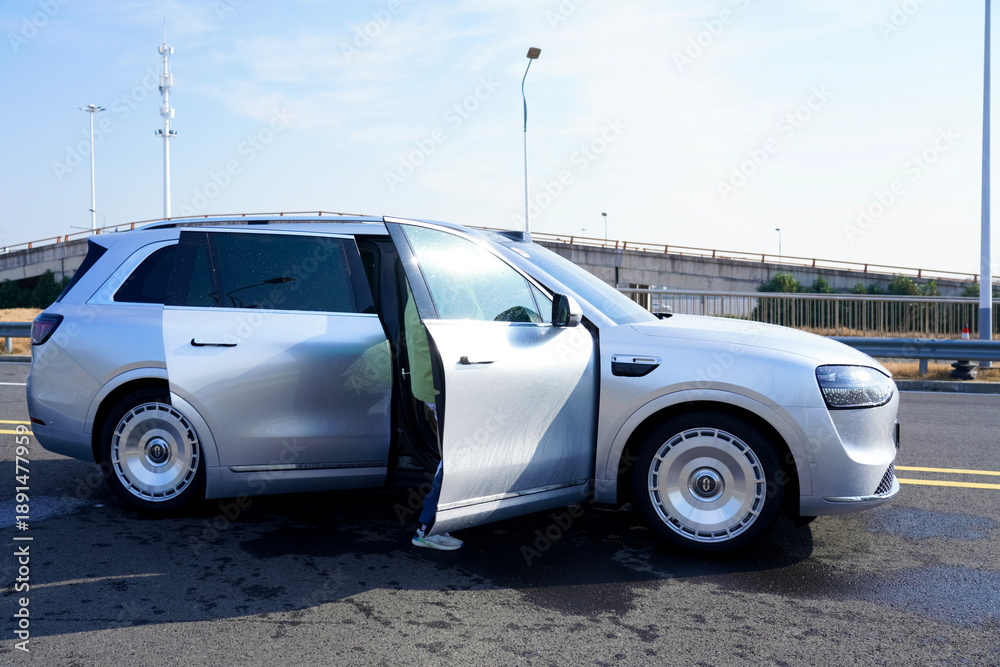 Fototapeta premium Chinese brand cars using Huawei's intelligent driving system are currently undergoing testing and trial drives.