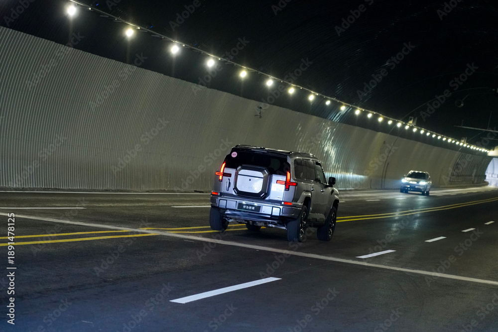 Obraz premium Chinese brand cars using Huawei's intelligent driving system are currently undergoing testing and trial drives.