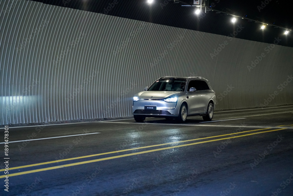 Fototapeta premium Chinese brand cars using Huawei's intelligent driving system are currently undergoing testing and trial drives.