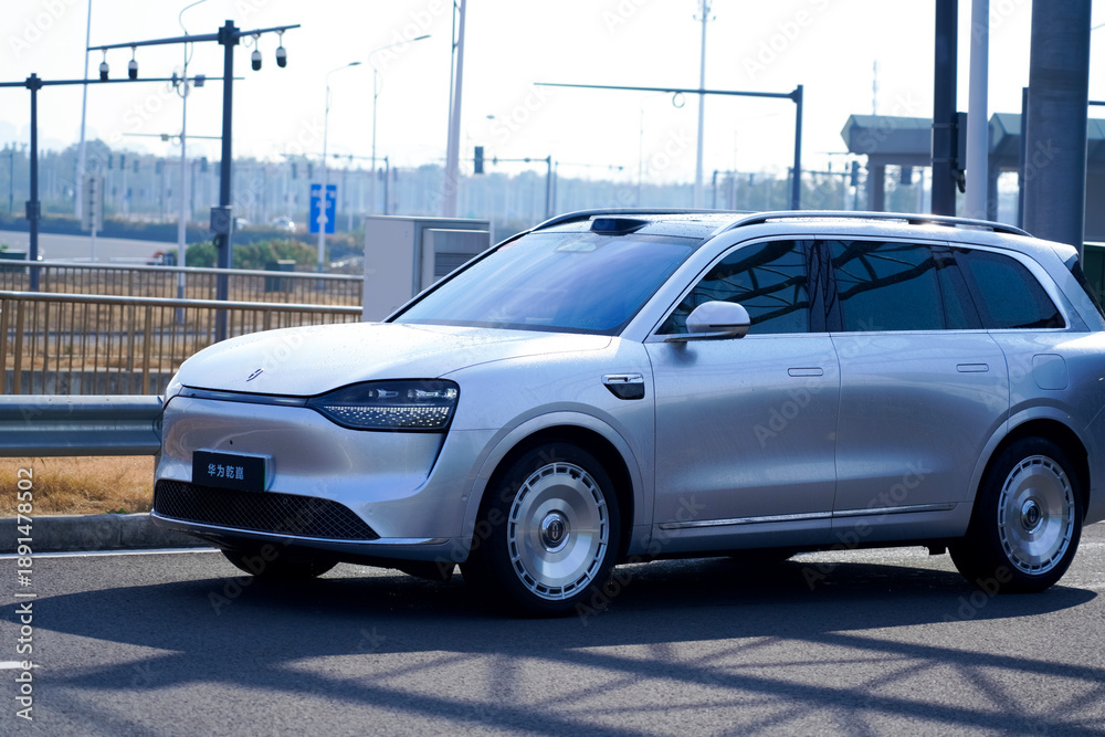 Fototapeta premium Chinese brand cars using Huawei's intelligent driving system are currently undergoing testing and trial drives.