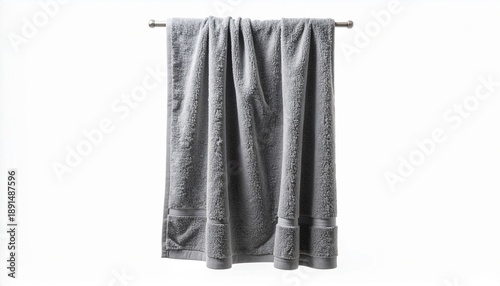 Wallpaper Mural A soft, plush gray bath towel made of cotton terry cloth hangs on a metal rod, neatly folded and displayed. This clean, absorbent textile is ready for use in a bathroom or spa, isolated on a white bg. Torontodigital.ca
