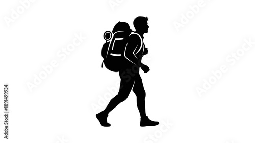 Silhouette of a hiker with a large backpack walking.