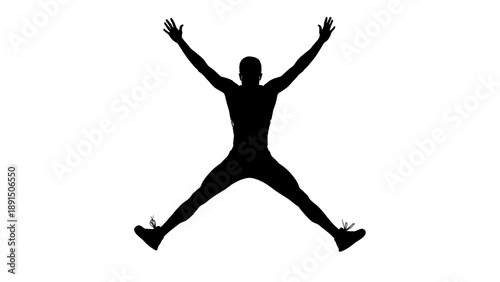 Silhouette of a man jumping with arms raised in celebration.