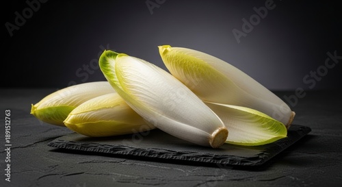 Wallpaper Mural Fresh endive chicory heads on dark slate background Torontodigital.ca