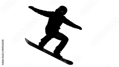 Silhouette of a snowboarder performing a trick mid-air.