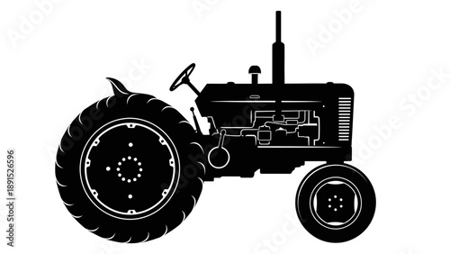 Silhouette of a vintage tractor, agricultural machinery, farm equipment.